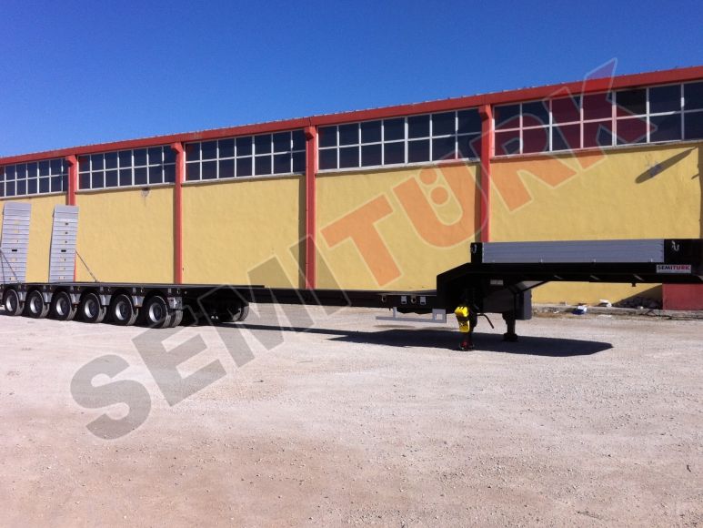 6 mechanically steered axles and longitudinal extent chassis lowbed